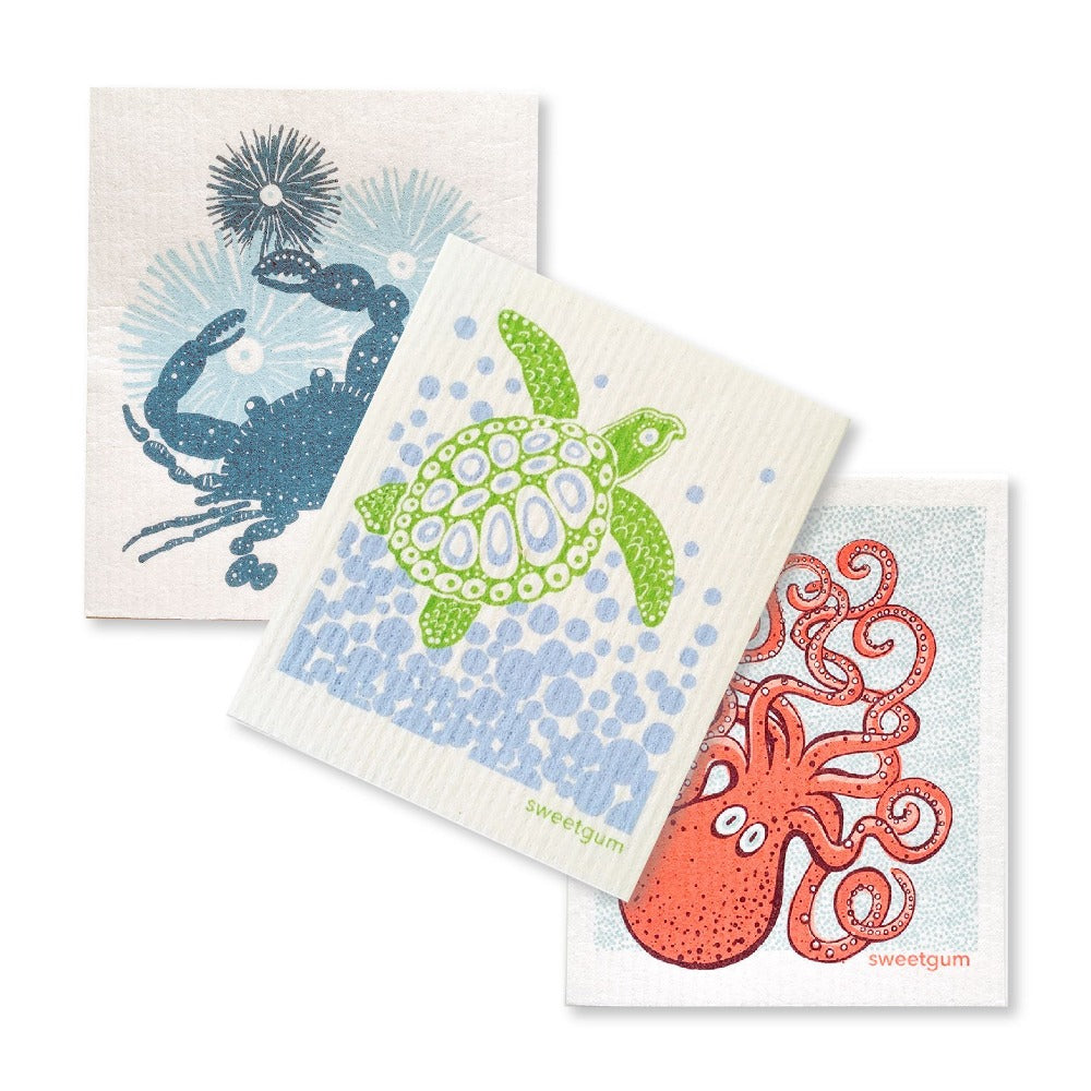Three printed Swedish dishcloths: sea turtle, crab and octopus