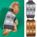 Small dog wearing a grey snowflake knit turtleneck sweater, with the grey and dark brown sweaters shown side by side