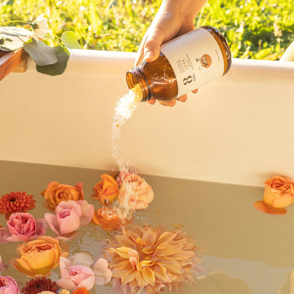 8 Days Botanicals Love Botanical Bath Soak with rose petals, lifestyle