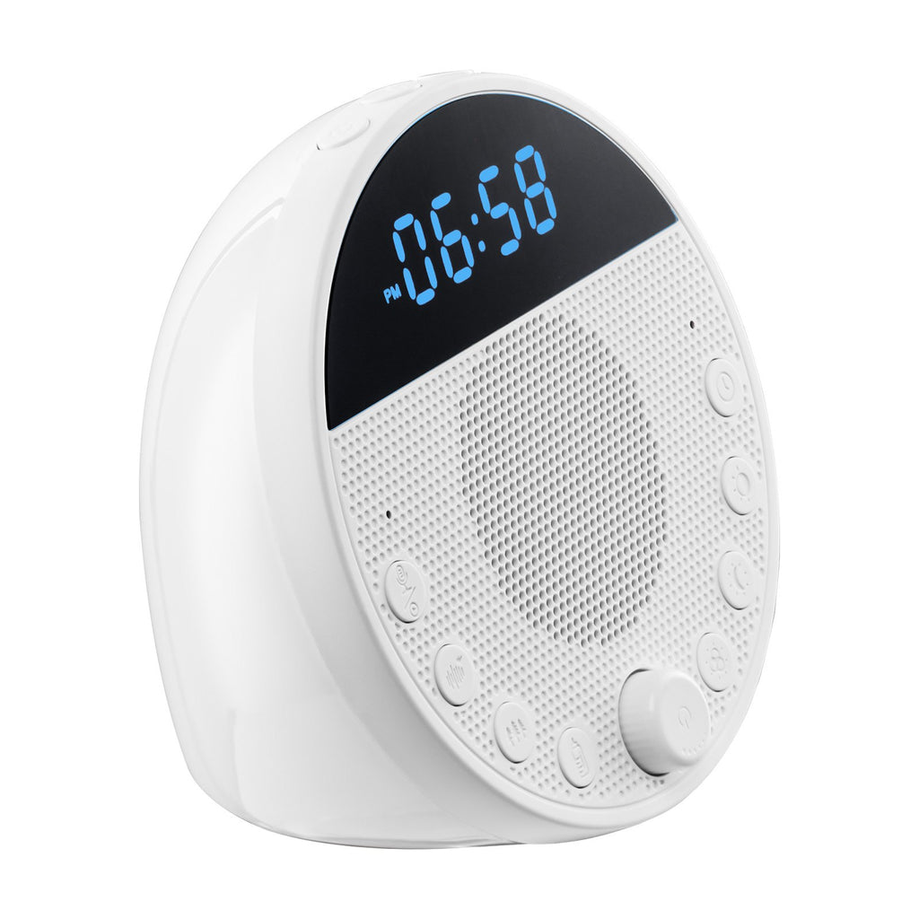 White noise sound machine, white, angled view showing the clock display and control dial
