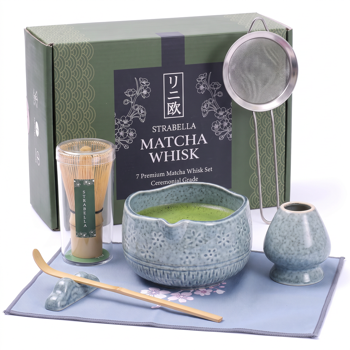 Chawan matcha ritual set with a blue ceramic bowl, bamboo whisk, scoop and whisk holder