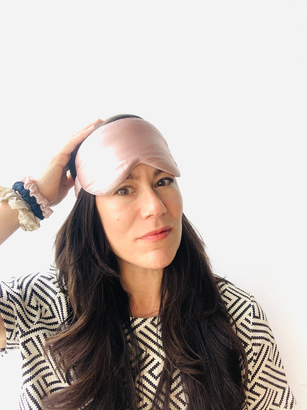 PURESOL Beauty mulberry silk sleep eye mask in mauve, worn