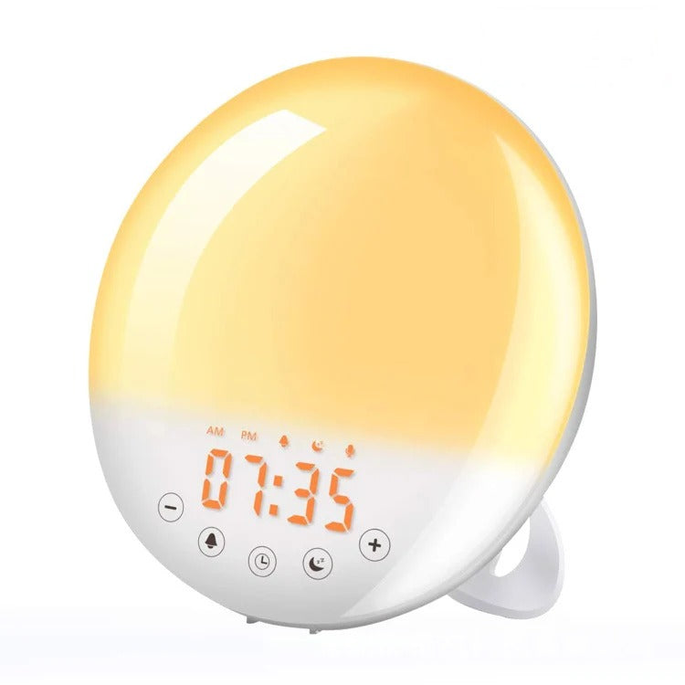 Hinode sunrise alarm clock glowing warm amber, with the time display